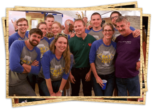 Group photo with everyone wearing special tee shirts and big smiles